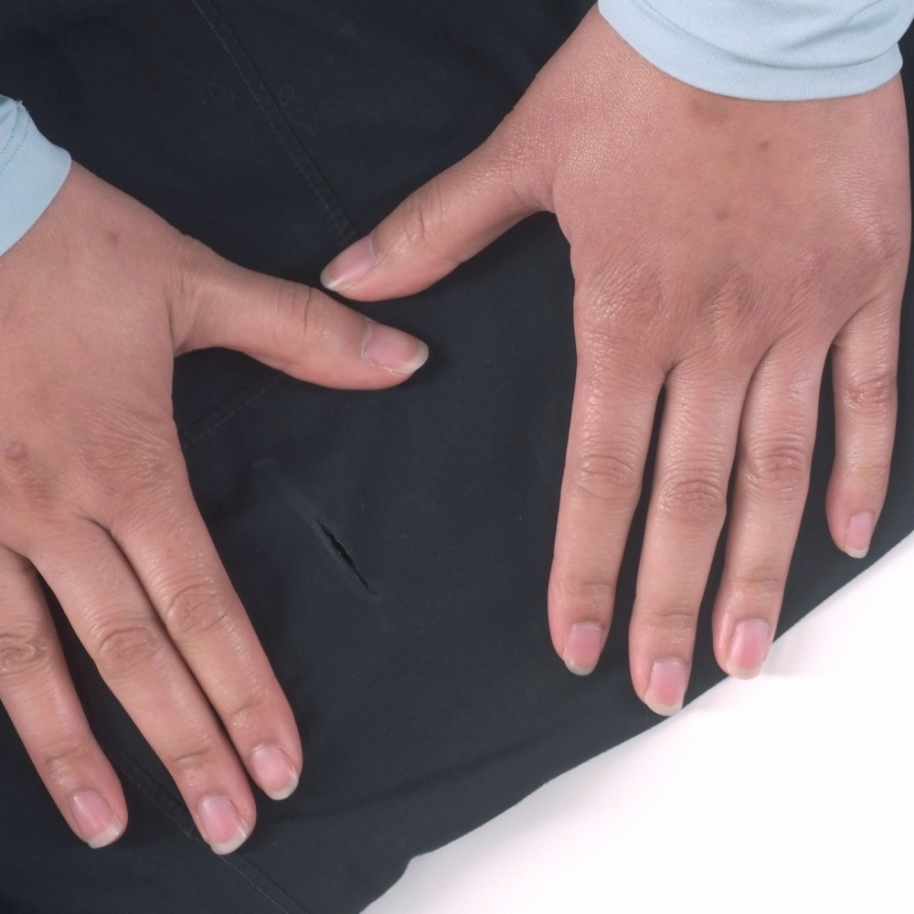 Anwendung 'Tenacious Tape' Gore-Tex Reparaturkit